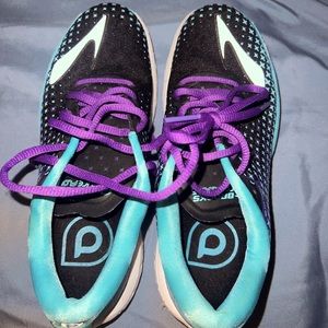 brooks running shoes. Worn a handful of times, they are a size too small for me